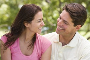 Couple outdoors smiling